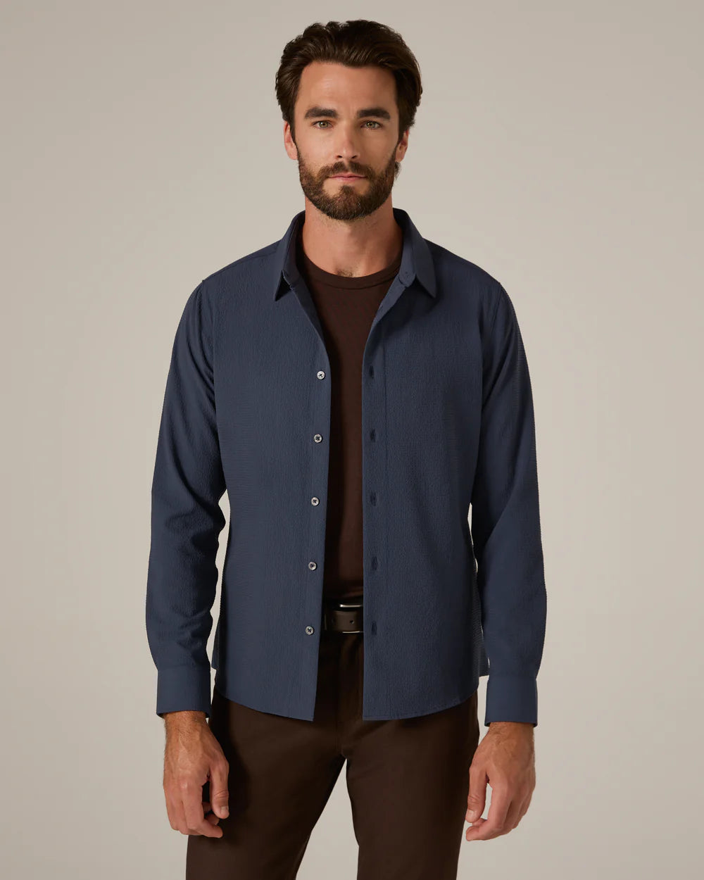 The Drayton Long Sleeve Shirt features an eco-friendly Modal blend that’s cool, breathable, and soft. Its seersucker-inspired texture promotes airflow to keep you comfortable all day. Finished with grosgrain tape and a signature locker loop, this tailored-fit shirt works perfectly under a blazer or on its own.