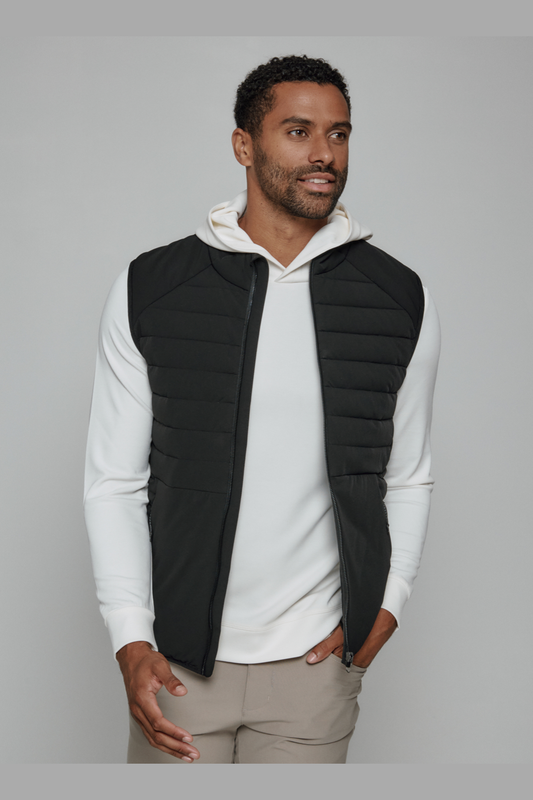 7 Diamonds Atlas vest in Black, a lightweight, easy-layering vest that adds warmth over a polo or quarter zip for golf mornings, travel days, the office and crisp fall weekends