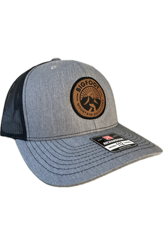 Bigfoot Mountain Outfitters signature mesh hat in Heather Grey/Black, a classic trucker hat for fishing, hiking, road trips, game days and everyday wear
