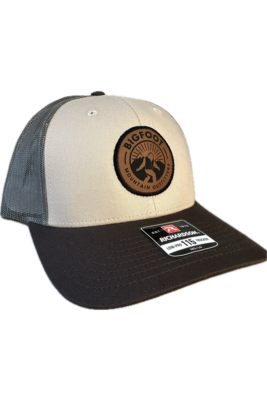 Bigfoot Mountain Outfitters signature mesh hat in Loden/Tan, a classic trucker hat for fishing, hiking, road trips, game days and everyday wear