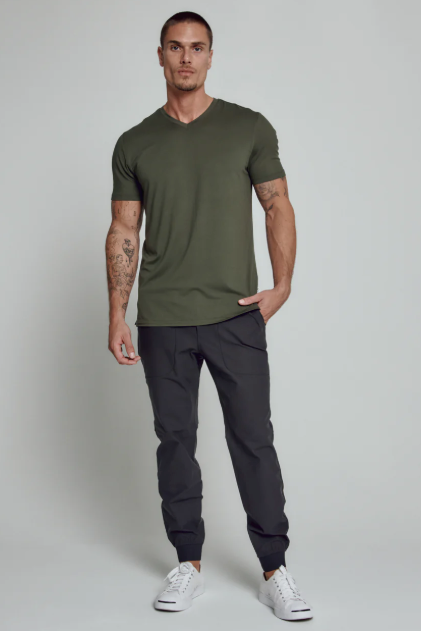 7 Diamonds Core V-neck tee in Olive, a soft, stretchy, sustainable everyday tee for layering under a jacket, travel days, the gym and weekends
