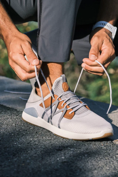 Olukai Mio Lī Sneaker - Mist Grey/Poi, a comfortable, versatile shoe for the office, travel days, dinners out and weekends