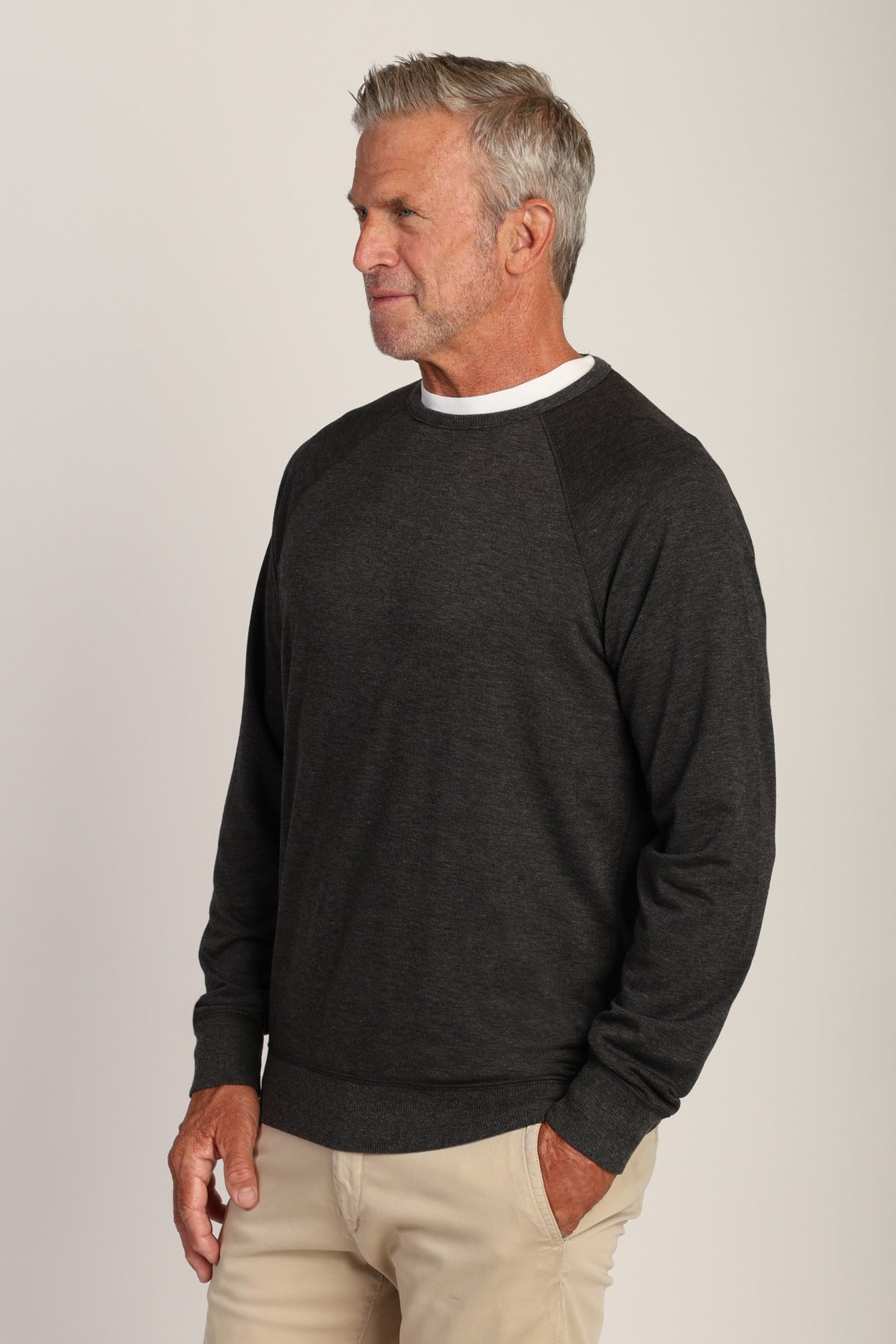 True Grit Raglan Sweatshirt - Vintage Charcoal, a soft, comfortable layer for cool evenings, travel days, campfires and weekend errands
